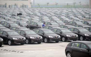 NINGBO, CHINA - MAY 15:  (CHINA OUT) Emgrand cars stand on a parking lot at Geely Automobile's Hangzhou Bay Production Base on May 15, 2012 in Ningbo, China. Geely Group sold 36,582 cars in April 2012, up 4.8% compared with the same period last year.  (Photo by Visual China Group via Getty Images/Visual China Group via Getty Images)