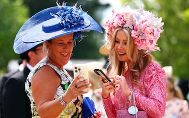 ASCOT, ENGLAND - JUNE 18: Race goers attend Day One of Royal Ascot 2024 at Ascot Racecourse on June 18, 2024 in Ascot, England. (Photo by Bryn Lennon/Getty Images)