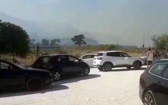 FRAME DA VIDEO - incendio all'aeroporto siciliano, fuga dei turisti
fonte Ignazio Marchese