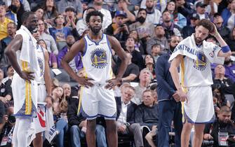 SACRAMENTO, CA - NOVEMBER 28: Draymond Green #23, Stephen Curry #30, Andrew Wiggins #22, and Klay Thompson #11 of the Golden State Warriors look on during the game against the Sacramento Kings during the In-Season Tournament on November 28, 2023 at Golden 1 Center in Sacramento, California. NOTE TO USER: User expressly acknowledges and agrees that, by downloading and or using this photograph, User is consenting to the terms and conditions of the Getty Images Agreement. Mandatory Copyright Notice: Copyright 2023 NBAE (Photo by Rocky Widner/NBAE via Getty Images)