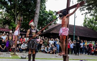 YOGYAKARTA, INDONESIA - MARCH 29: Indonesian Catholics participate in a re-enactment of the crucifixion of Jesus Christ on Good Friday at The Church of the Sacred Heart of Jesus, or Ganjuran Church, on March 29, 2024, in Bantul, Yogyakarta, Indonesia. (Photo by Garry Lotulung/Anadolu via Getty Images)