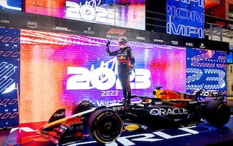 QATAR - Max Verstappen (Red Bull Racing) celebrates his third Formula 1 world championship after the sprint race prior to the Formula 1 Grand Prix at the Lusail International Circuit in Qatar. ANP SEM VAN DER WAL (Photo by ANP via Getty Images)