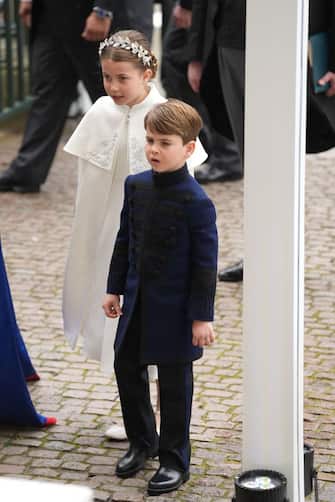 Britain's Princess Charlotte of Wales and Britain's Prince Louis of Wales arrive at Westminster Abbey in central London on May 6, 2023, ahead of the coronations of Britain's King Charles III and Britain's Camilla, Queen Consort. - The set-piece coronation is the first in Britain in 70 years, and only the second in history to be televised. Charles will be the 40th reigning monarch to be crowned at the central London church since King William I in 1066. Outside the UK, he is also king of 14 other Commonwealth countries, including Australia, Canada and New Zealand. Camilla, his second wife, will be crowned queen alongside him, and be known as Queen Camilla after the ceremony. (Photo by Dan CHARITY / POOL / AFP) (Photo by DAN CHARITY/POOL/AFP via Getty Images)