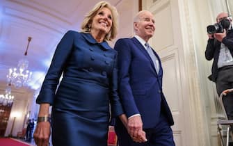 epa10535689 First Lady Dr. Jill Biden and US President Joe Biden arrive during a ceremony for the recipients of the 2021 National Humanities Medal and the 2021 National Medal of Arts, in the East Room of the White House in Washington, DC, USA, 21 March 2023. The ceremony for the recipients of the 2021 medals was previously delayed due to the COVID-19 pandemic.  EPA/Oliver Contreras / POOL