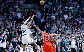 BOSTON, MA - FEBRUARY 3: Boston Celtics small forward Paul Pierce (34) takes a three point jumpshot over Los Angeles Clippers small forward Matt Barnes (22) to win the game during the Boston Celtics 106-104 victory over the Los Angeles Clippers at TD Garden on February 3, 2013 in Boston, Massachusetts. NOTE TO USER: User expressly acknowledges and agrees that, by downloading and or using this photograph, User is consenting to the terms and conditions of the Getty Images License Agreement. (Photo by Chris Elise/Getty Images)