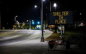 epa10939766 A road sign reads 'Shelter in Place' after a man reportedly opened fire killing and injuring numerous people in downtown Lewiston, Maine, USA, 25 October 2023. Early reports indicate as many as 20 people have been killed, and dozens injured. Police are still searching for the suspect.  EPA/CJ GUNTHER