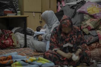 Donne sfollate a Gaza per la guerra con Israele