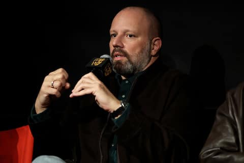 NEW YORK, NEW YORK - OCTOBER 19: Yorgos Lanthimos speaks onstage at the BAFTA New York Screening: "Bugonia" at Village East Cinema on October 19, 2025 in New York City. (Photo by Dominik Bindl/Getty Images)