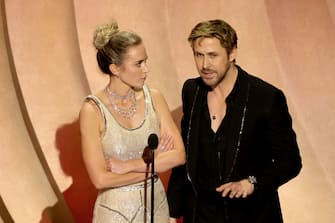 HOLLYWOOD, CALIFORNIA - MARCH 10: (L-R) Emily Blunt and Ryan Gosling speak onstage during the 96th Annual Academy Awards at Dolby Theatre on March 10, 2024 in Hollywood, California. (Photo by Kevin Winter/Getty Images)