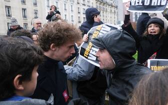 A member of the student union Union Syndicale Lyceenne clashes with a demonstrator opposed to the wreath-laying rally organized by, among others, La France Insoumise on the Square de la Place des Martyrs juifs du Velodrome d'Hiver to oppose "anti-Semitism and all racism". Paris, France, on November 12, 2023. Photos by Jeremy Paoloni/ABACAPRESS.COM