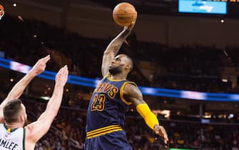 CLEVELAND, OH - MARCH 23: LeBron James #23 of the Cleveland Cavaliers goes up for a dunk over Miles Plumlee #18 of the Milwaukee Bucks during the second half at Quicken Loans Arena on March 23, 2016 in Cleveland, Ohio. The Cavaliers defeated the Bucks 113-104. NOTE TO USER: User expressly acknowledges and agrees that, by downloading and/or using this photograph, user is consenting to the terms and conditions of the Getty Images License Agreement. Mandatory copyright notice. (Photo by Jason Miller/Getty Images) *** Local Caption ***LeBron James; Miles Plumlee