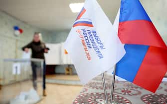RUSSIA, REPUBLIC OF CRIMEA - MARCH 17, 2024: Flags are pictured during the 2024 Russian presidential election at a polling station in the city of Bakhchisarai. Four candidates are on the ballot: Vladislav Davankov of the New People Party, incumbent president, independent candidate Vladimir Putin, Leonid Slutsky of the Liberal Democratic Party and Nikolai Kharitonov of the Russian Communist Party. Sergei Malgavko/TASS/Sipa USA