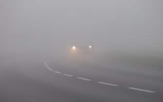 Milton Keynes,Bucks,UK, April 8th 2023. car driving in the fog on an English country road