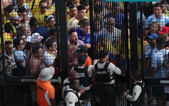 MIAMI GARDENS, FLORIDA - JULY 14: Large crowds of fans try to enter the stadium amid disturbances prior to the CONMEBOL Copa America 2024 Final match between Argentina and Colombia at Hard Rock Stadium on July 14, 2024 in Miami Gardens, Florida. (Photo by Megan Briggs/Getty Images)