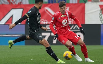AC Monza's forward Daniel Maldini in action against Cagliari's defender  José Palomino during the Italian Serie A soccer match between AC Monza and Cagliari at U-Power Stadium in Monza, Italy, 5 January 2025. ANSA / ROBERTO BREGANI
