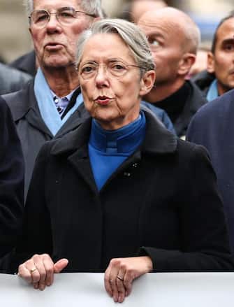 epa10971879 French Prime Minister Elisabeth Borne (C) participates in a march against rising anti-Semitism, called by the presidents of French Senate and National Assembly, in Paris, France, 12 November 2023. Thousands of demonstrators marched in Paris against anti-Semitism on 12 November, as tensions have risen in the French capital, which is home to large Jewish and Muslim communities, following the 07 October attack by the militant group Hamas on Israel.Thousands of Israelis and Palestinians have died since the militant group Hamas launched an unprecedented attack on Israel from the Gaza Strip on 07 October, and the Israeli strikes on the Palestinian enclave which followed it.  EPA/MOHAMMED BADRA