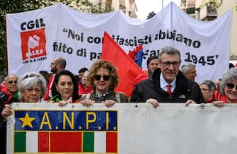 Secretary of Cgil Union, Maurizio Landini (R), takes part in a rally, organized by the National Association of Italian Partisans (Anpi), marking the 78th anniversary of the Liberation Day (Festa della Liberazione), a nationwide public holiday in Italy that is annually celebrated on 25 April to remember Italian Partisans who fought against Nazists and Mussolini's troops during World War II and to honor those who served in the Italian Resistance, Rome, Italy, 25 April 2023. ANSA/RICCARDO ANTIMIANI