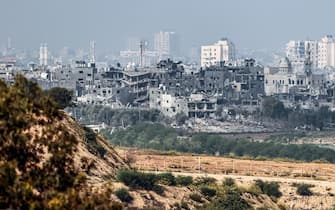 epa10934182 A general view of destroyed buildings in the northern part of the Gaza Strip as seen from Sderot, Israel, 23 October 2023. More than 4,700 Palestinians and over 1,400 Israelis have been killed, according to the Israel Defense Forces (IDF) and the Palestinian health authority, since Hamas militants launched an attack against Israel from the Gaza Strip on 07 October.  EPA/HANNIBAL HANSCHKE