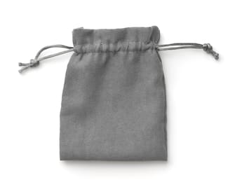 Top view of empty gray fabric drawstring gift bag isolated on white