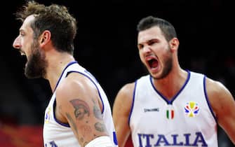 FOSHAN, CHINA - SEPTEMBER 02: #3 Marco Belinelli and #8 Danilo Gallinari of the Italy National Team reacts during the match against the Angola National Team during the 1st round of 2019 FIBA World Cup at GBA International Sports and Cultural Center on September 02, 2019 in Foshan, China. (Photo by Zhong Zhi/Getty Images)