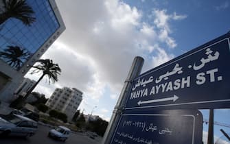 A street sign indicates the newly-named Yahya Ayyash Street in the West Bank town of Ramallah on April 8, 2010. The naming of the street by the Palestinian Authority after slain Nablus-born Ayyash, who Israel says was the architect of several "terror" attacks including a 1994 bombing of a Tel Aviv bus, prompted Israeli Prime Minister Benjamin Netanyahu to release a statement, saying it was an "outrageous glorification of terrorism by the Palestinian Authority." AFP PHOTO/ABBAS MOMANI (Photo credit should read ABBAS MOMANI/AFP via Getty Images)