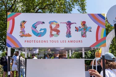 Gay Pride parade. Banner sign reading "LGBT+ Let's protect all loves". Paris, Ile de France, France, Europe, European Union, EU. (Photo by: Glen Sterling/UCG/Universal Images Group via Getty Images)