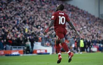 epa07124467 Liverpool's Sadio Mane celebrates scoring the fifth goal making the score 4-1 during the English Premier League soccer match between Liverpool and Cardiff City at the Anfield in Liverpool, Britain, 27 October 2018.  EPA/PETER POWELL EDITORIAL USE ONLY. No use with unauthorized audio, video, data, fixture lists, club/league logos or 'live' services. Online in-match use limited to 75 images, no video emulation. No use in betting, games or single club/league/player publications