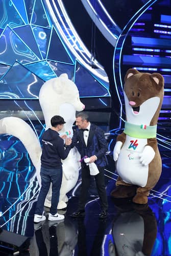SANREMO, ITALY - FEBRUARY 07: The mascots of the Milan-Cortina 2026 Winter Olympics and Paralympics, Federico Barra and Amadeus attend the 74th Sanremo Music Festival 2024 at Teatro Ariston on February 07, 2024 in Sanremo, Italy. (Photo by Daniele Venturelli/Daniele Venturelli/Getty Images )