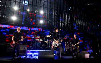 INGLEWOOD, CALIFORNIA - JANUARY 30: Joan Jett (C) performs onstage with (L-R) Pat Smear, Dave Grohl, and Krist Novoselic of Nirvana during the FIREAID Benefit Concert for California Fire Relief at The Kia Forum on January 30, 2025 in Inglewood, California.  (Photo by John Shearer/Getty Images for FIREAID)