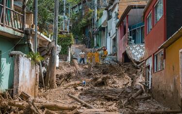 Damage from a landslide following heavy rain and flooding in Barra do Sahy, Sao Paulo state, Brazil, on Friday, Feb. 24, 2023. Heavy rains inundated the Sao Paulo coast during the week of Carnival, causing flooding and landslides that left dozens dead and missing. Photographer: Tuane Fernandes/Bloomberg via Getty Images