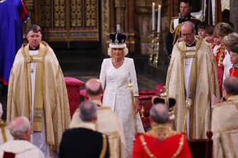 LONDON, ENGLAND - MAY 06:  Queen Camilla is crowned by Archbishop of Canterbury Justin Welby during her coronation ceremony in Westminster Abbey, on May 6, 2023 in London, England. The Coronation of Charles III and his wife, Camilla, as King and Queen of the United Kingdom of Great Britain and Northern Ireland, and the other Commonwealth realms takes place at Westminster Abbey today. Charles acceded to the throne on 8 September 2022, upon the death of his mother, Elizabeth II. (Photo by Richard Pohle - WPA Pool/Getty Images)