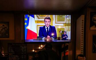 epa11759130 A screen shows the French President Emmanuel Macron delivering a televised speech to the French nation, in Paris, France, 05 December 2024. French President Emmanuel Macron addressed the nation a day after the government of the French Prime Minister Michel Barnier lost a no-confidence vote at the National Assembly.  EPA/TERESA SUAREZ