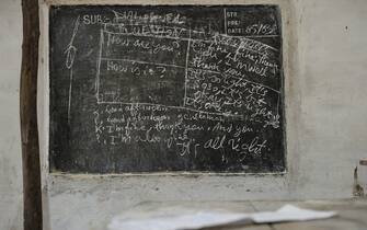 Blackboard in a school in a refugee camp. Aroud 16; 000 Internally Displaced People live in the region of Rutshuru in North Kivu and Kiwanja. Still further west of the region fighting continues between government forces; Mai Mai-Meliz and rebel forces; such as the FDLR and the CNDP. Throughout the Democratic Republic of Congo; formerly Zaire; more than 1.5 million people are on the run.