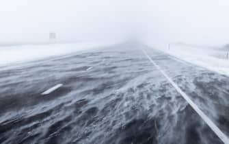Snow moves across a highway during a blizzard in Iowa on January 12, 2024. Photo by Julia Nikhinson/ABACAPRESS.COM