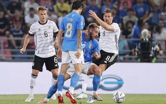 Italy's  Davide Frattesi    and Germany's Leon Goretzka   in action during the Uefa Nations League,group A3,soccer match Italy vs Germany at Renato Dall'Ara stadium in Bologna, Italy, 04 June 2022. ANSA /SERENA CAMPANINI
