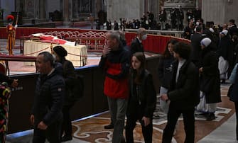 The body of the late Pope Emeritus Benedict XVI (Joseph Ratzinger) lies in state in the Saint Peter's Basilica for public viewing, Vatican City, 02 January 2023. Former Pope Benedict XVI died on 31 December at his Vatican residence, aged 95. For three days, starting from 02 January, the body will lay in state in St Peter's Basilica until the funeral on 05 January. ANSA/ETTORE FERRARI
