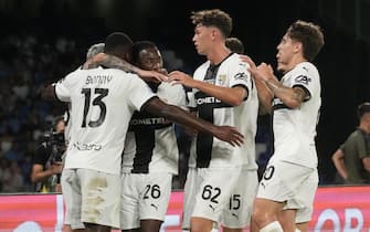  Parmaâ  s forward Ange Yoan Bonny  jubilates with his teammate after scoring the goal   during the Italian Serie A soccer match SSC Napoli vs FC Parma at "Diego Armando Maradona" stadium in Naples, Italy, 31 August 2024  ANSA/CESARE ABBATE