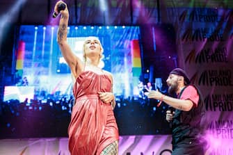 MILAN, ITALY - JUNE 24: Francesca Mesiano aka California and Fausto Zanardelli aka Fausto Lama of Coma_Cose perform during the Milano Pride 2023 closing event at Arco Della Pace on June 24, 2023 in Milan, Italy. Milano Pride is a parade and festival held at the end of June each year in Milan, to celebrate LGBTQ+ people and their allies. (Photo by Sergione Infuso/Getty Images for Milano Pride)