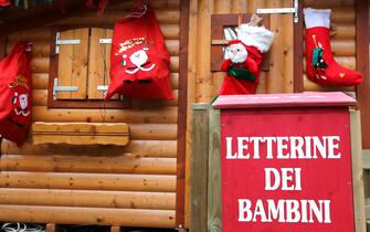 Santa's cottage with the red mailbox to post the letters of children