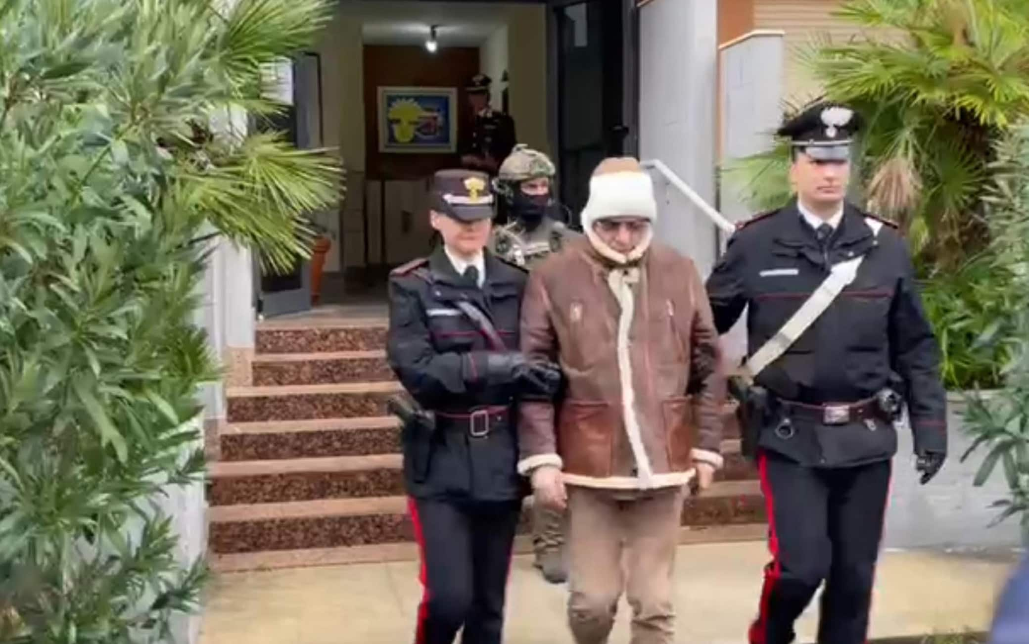 A handout photo made available by Italy's Carabinieri shows a video frame of the Mafia boss Matteo Messina Denaro (C), Italy's most wanted man, being arrested in Palermo, Sicily, by the Carabinieri police's ROS unit after 30 years on the run  in Palermo, Sicily island, Italy, 16 January 2023.
ANSA/US CARABINIERI +++ NO SALES, EDITORIAL USE ONLY +++ NPK +++