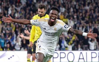 epa11384654 Vinicius Junior of Madrid celebrates after scoring his team's second goal during the UEFA Champions League final match of Borussia Dortmund against Real Madrid, in London, Britain, 01 June 2024.  EPA/NEIL HALL
