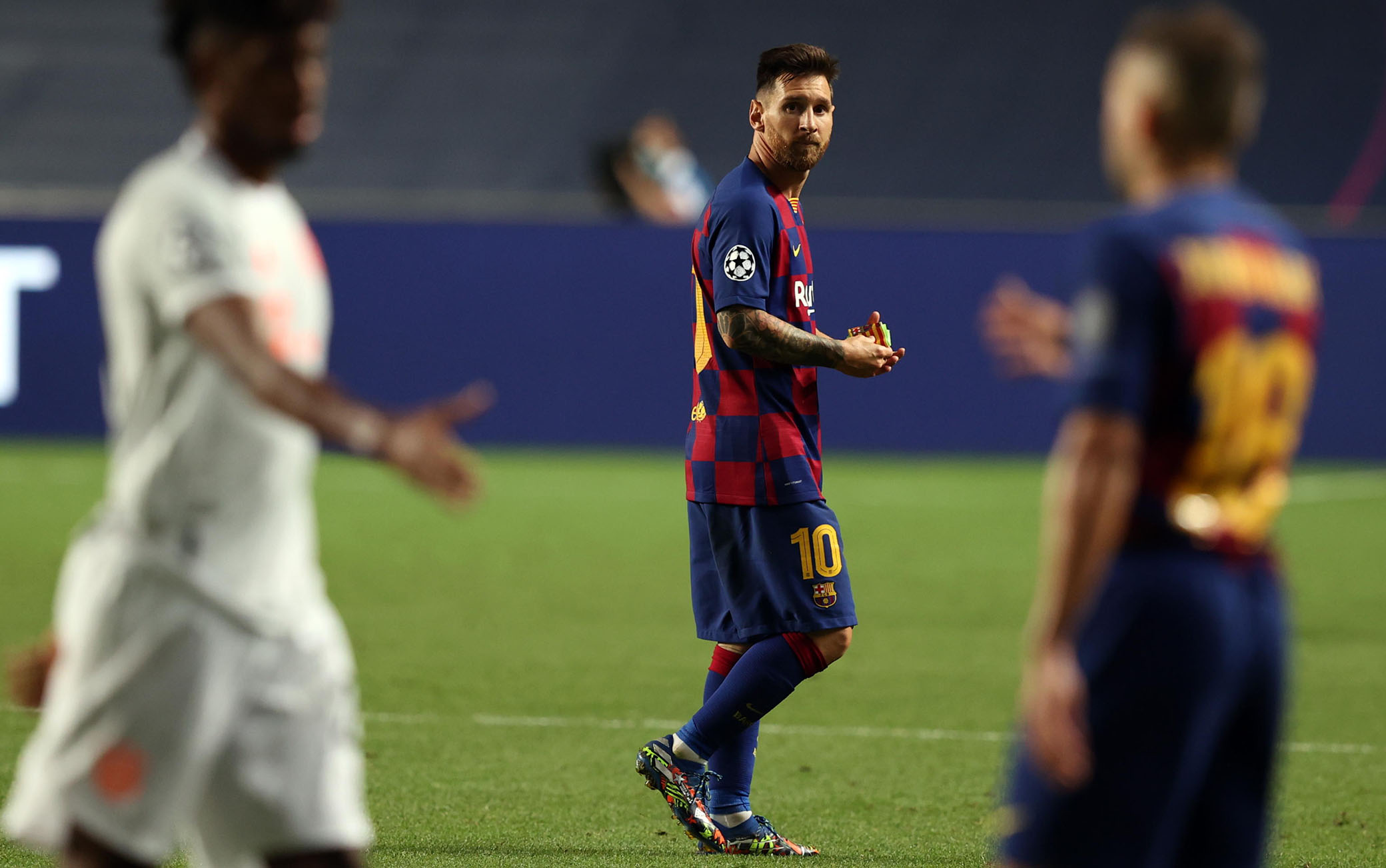 epa08604435 Lionel Messi of Barcelona reacts at the end of the UEFA Champions League quarter final match between Barcelona and Bayern Munich in Lisbon, Portugal, 14 August 2020.  EPA/Rafael Marchante / POOL