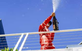 Interlagos, Sao Paulo, Brazil.
Sunday 12 November 2017.
Sebastian Vettel, Ferrari, 1st Position, sprays the champagne on the podium.
World Copyright: Steven Tee/LAT Images 
ref: Digital Image _O3I0889