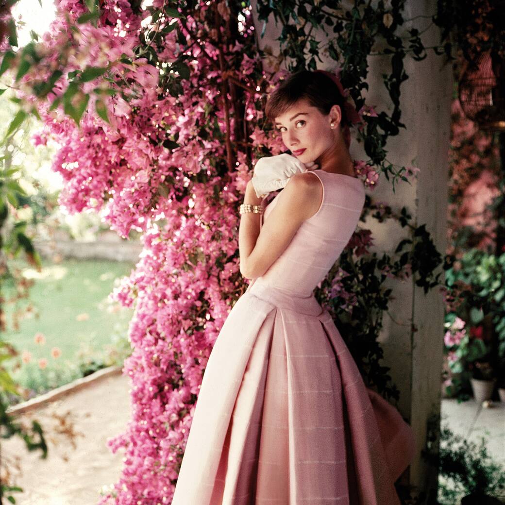 Audrey Hepburn (1929-1993), photographed at La Vigna, Hepburn's villa outside Rome, Glamour, December 1955 © Norman Parkinson Archive / Iconic Images 2025