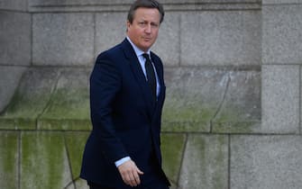 LONDON, ENGLAND - NOVEMBER 23: Former Prime Minister David Cameron arrives ahead of a requiem mass held in honour of Sir David Amess MP at Westminster Cathedral on November 23, 2021 in London, England. Cardinal Vincent Nichols held the mass for Sir David, a Catholic, who was stabbed to death at a surgery meeting in his constituency of Southend West on October 15, 2021.  He is survived by his wife, Julia, one son and four daughters. (Photo by Leon Neal/Getty Images)