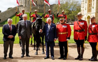 WINDSOR, ENGLAND - APRIL 28: King Charles III (centre) alongside Ralph Goodale, the High Commissioner for Canada in the UK (left) and Royal Canadian Mounted Police (RCMP) Commissioner Mike Duheme (third right) after he was officially presented with 'Noble', a horse given to him by the RCMP earlier this year, as he formally accepted the role of Commissioner-in-Chief of the RCMP during a ceremony in the quadrangle at Windsor Castle on April 28, 2023 in Windsor, England. The King, when the Prince of Wales, took on the role of Honorary Commissioner of the RCMP in 2012 during a visit to Depot Division in Regina, Saskatchewan. (Photo by Andrew Matthews - WPA Pool/Getty Images)