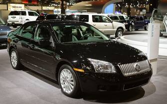 CHICAGO - FEBRUARY 10:  The new Mercury Milan sedan is displayed at the 2005 Chicago Auto Show February 10, 2005 in Chicago, Illinois. This is the 97th edition of the Chicago Auto Show.  (Photo by Tim Boyle/Getty Images)