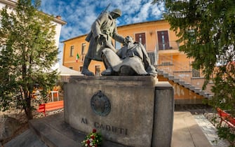 Borgo San Dalmazzo, Cuneo, Italy- December 01, 2022: monument of the fallen of the wars in piazza Liberazione (liberation square) near the town hall