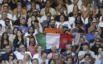 epa11109932 Supporters of Italy's Jannik Sinner cheer during his Men's Singles final match against  Daniil Medvedev of Russia at the 2024 Australian Open tennis tournament, in Melbourne, Australia, 28 January 2024.  EPA/MAST IRHAM