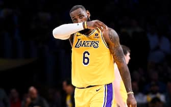 LOS ANGELES, CA - MAY 22: Los Angeles Lakers forward LeBron James wipes his face during the fourth quarter of game four in the NBA Playoffs Western Conference Finals against the Denver Nuggets at Crypto.com Arena on Monday, May 22, 2023 in Los Angeles, CA. (Wally Skalij / Los Angeles Times via Getty Images)